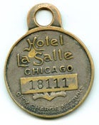 An early charge coin, whose bearer could stay at Chicago's Hotel La Salle